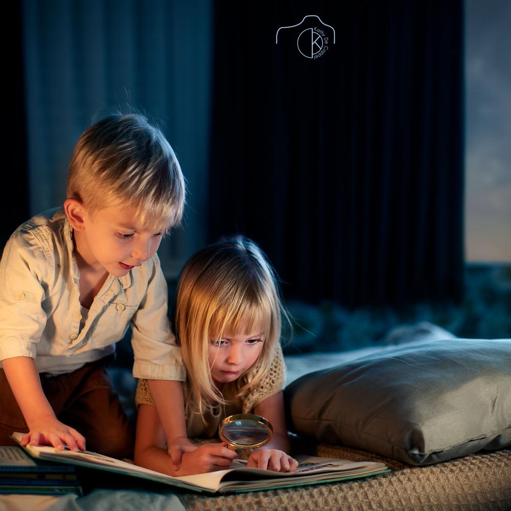 Kinderen lezen op bed